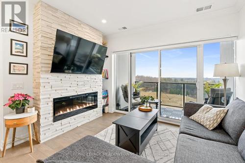 801 - 1880 Gordon Street, Guelph, ON - Indoor Photo Showing Living Room With Fireplace