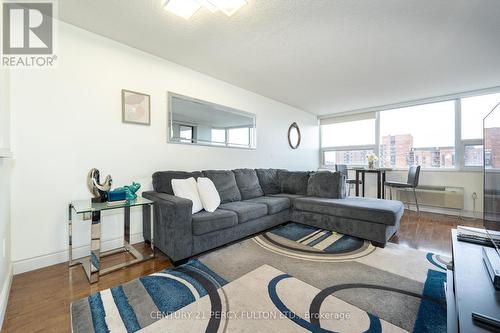 1612 - 121 Ling Road, Toronto, ON - Indoor Photo Showing Living Room