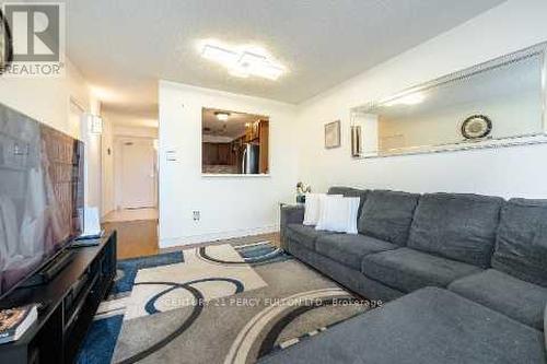 1612 - 121 Ling Road, Toronto, ON - Indoor Photo Showing Living Room