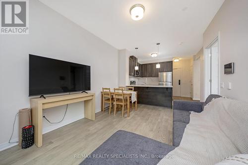 313 - 470 Gordon Krantz Avenue, Milton, ON - Indoor Photo Showing Living Room