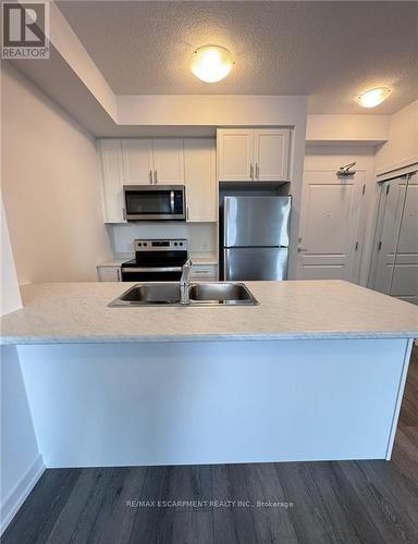 325 - 470 Dundas Street E, Hamilton, ON - Indoor Photo Showing Kitchen With Double Sink