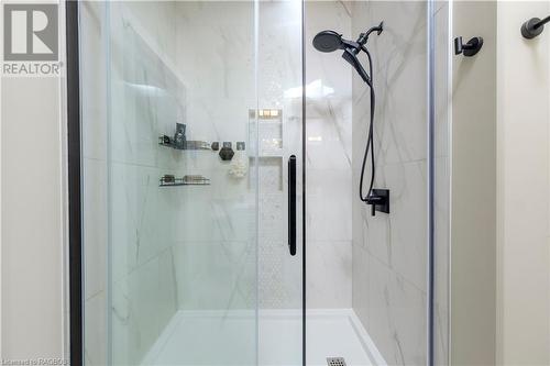 Bathroom with a shower with shower door - 33 Madwayosh Street, Southampton, ON - Indoor Photo Showing Bathroom