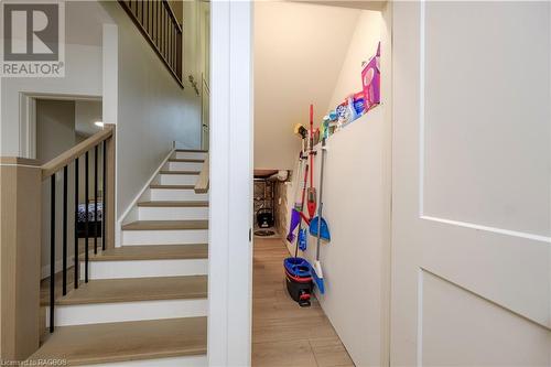 Staircase with hardwood / wood-style flooring - 33 Madwayosh Street, Southampton, ON - Indoor Photo Showing Other Room