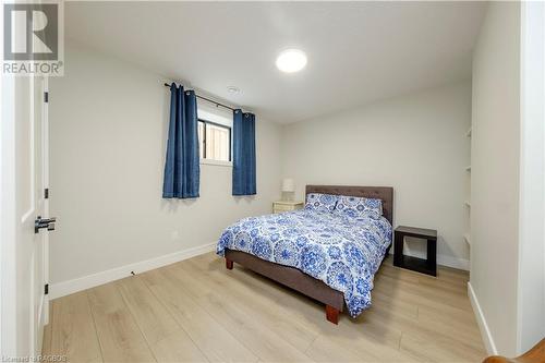 Bedroom featuring hardwood / wood-style flooring - 33 Madwayosh Street, Southampton, ON - Indoor Photo Showing Bedroom