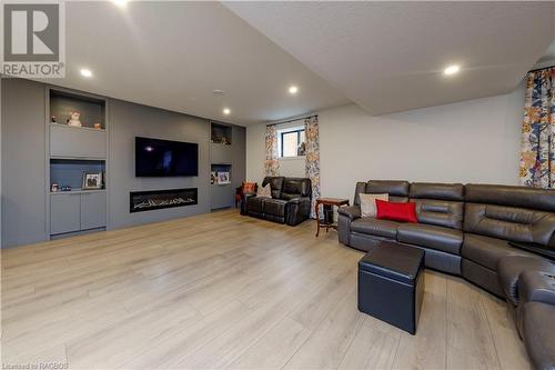 Living room featuring light hardwood / wood-style floors - 33 Madwayosh Street, Southampton, ON - Indoor