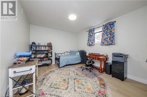 Office with light hardwood / wood-style floors and a textured ceiling - 33 Madwayosh Street, Southampton, ON - Indoor