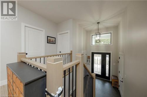 Foyer entrance featuring a chandelier - 33 Madwayosh Street, Southampton, ON - Indoor Photo Showing Other Room