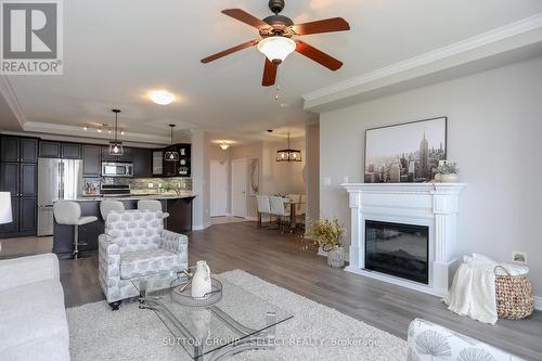 1008 - 1030 Coronation Drive, London, ON - Indoor Photo Showing Living Room With Fireplace