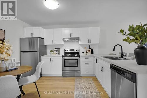 59 Tanner Drive N, London, ON - Indoor Photo Showing Kitchen With Double Sink