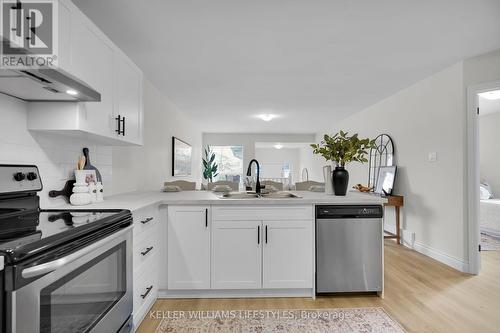 59 Tanner Drive N, London, ON - Indoor Photo Showing Kitchen With Double Sink With Upgraded Kitchen