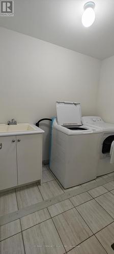 10 Coho Drive, Whitby, ON - Indoor Photo Showing Laundry Room