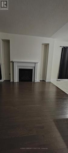 10 Coho Drive, Whitby, ON - Indoor Photo Showing Living Room With Fireplace