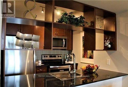 1808 - 125 Village Green Square, Toronto, ON - Indoor Photo Showing Kitchen With Stainless Steel Kitchen