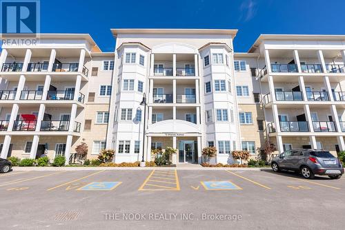 302 - 70 Shipway Avenue, Clarington (Newcastle), ON - Outdoor With Balcony With Facade