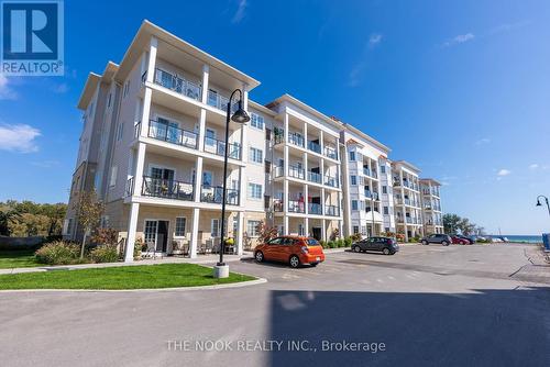 302 - 70 Shipway Avenue, Clarington (Newcastle), ON - Outdoor With Balcony With Facade