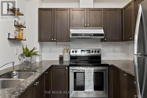 302 - 70 Shipway Avenue, Clarington (Newcastle), ON - Indoor Photo Showing Kitchen With Stainless Steel Kitchen With Double Sink