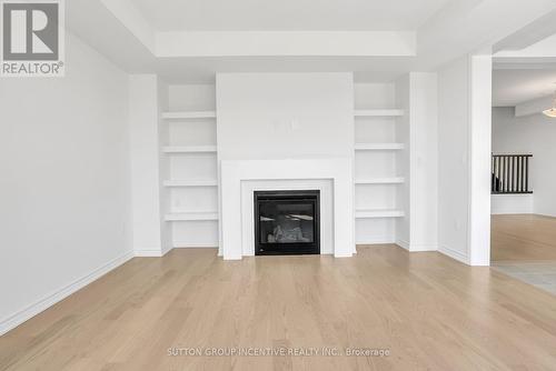 Upper - 59 Suzuki Street, Barrie, ON - Indoor Photo Showing Living Room With Fireplace