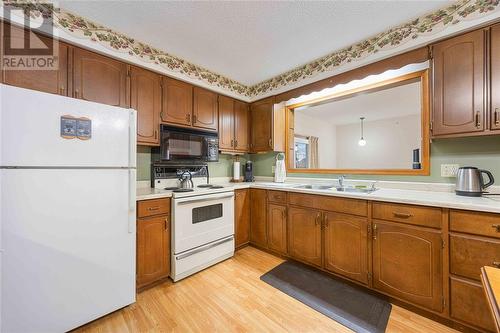 8448 Keith Street, Lambton Shores, ON - Indoor Photo Showing Kitchen With Double Sink