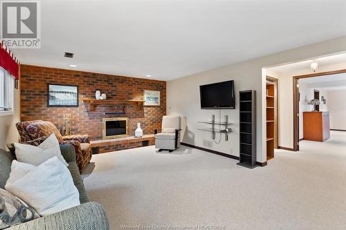 12139 Orchard, Tecumseh, ON - Indoor Photo Showing Living Room With Fireplace