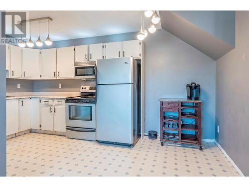 4202 Alexis Park Drive Unit# 215, Vernon, BC - Indoor Photo Showing Kitchen With Stainless Steel Kitchen