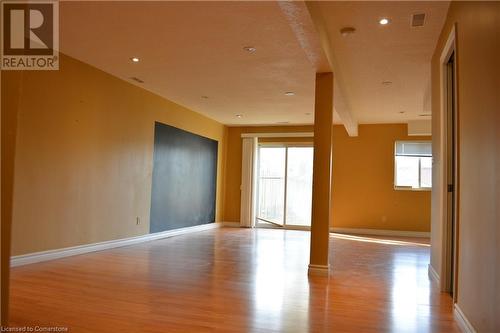 Empty room featuring a healthy amount of sunlight and light wood-type flooring - 147 Weber Street E, Kitchener, ON - Indoor Photo Showing Other Room