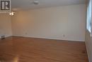 Unfurnished room featuring ceiling fan and light hardwood / wood-style flooring - 147 Weber Street E, Kitchener, ON  - Indoor Photo Showing Other Room 