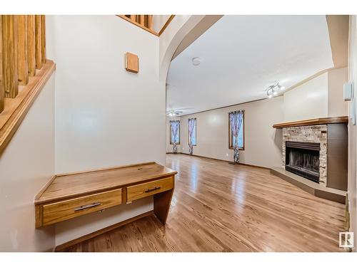 7008 157 Av Nw, Edmonton, AB - Indoor With Fireplace