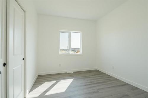 41 Falcon Drive, New Bothwell, MB - Indoor Photo Showing Other Room