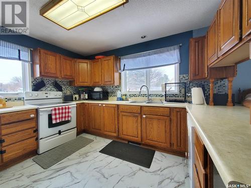 703 Central Avenue, Kamsack, SK - Indoor Photo Showing Kitchen With Double Sink