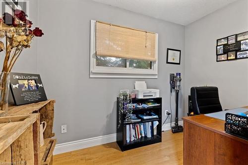 Office area featuring a textured ceiling and light wood-type flooring - 830 Elma Street W, Listowel, ON - Indoor Photo Showing Office