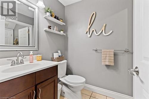 Bathroom with tile patterned floors, vanity, and toilet - 830 Elma Street W, Listowel, ON - Indoor Photo Showing Bathroom