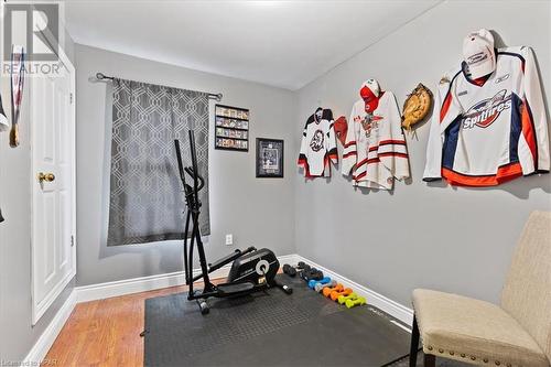 Workout room featuring hardwood / wood-style floors - 830 Elma Street W, Listowel, ON - Indoor