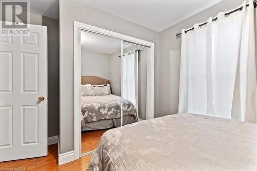 Bedroom with a closet and hardwood / wood-style flooring - 830 Elma Street W, Listowel, ON - Indoor Photo Showing Bedroom