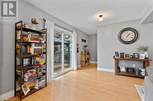 Sitting room featuring a textured ceiling and light wood-type flooring - 830 Elma Street W, Listowel, ON - Indoor Photo Showing Other Room