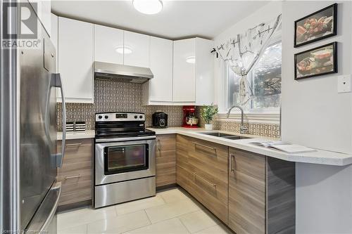 1221 Dundix Road Unit# 176, Mississauga, ON - Indoor Photo Showing Kitchen With Double Sink