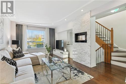 1221 Dundix Road Unit# 176, Mississauga, ON - Indoor Photo Showing Living Room With Fireplace