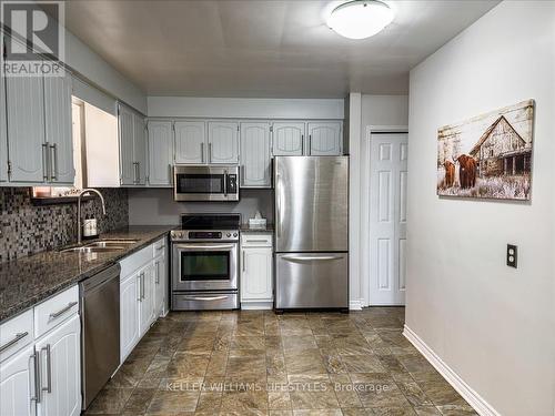 312 Oak Avenue, Strathroy-Caradoc (Sw), ON - Indoor Photo Showing Kitchen With Stainless Steel Kitchen With Double Sink