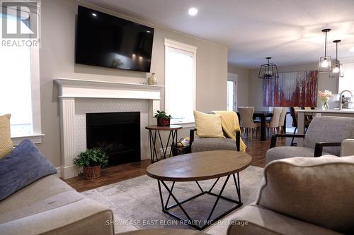 145 Tarry Parkway, Aylmer (Ay), ON - Indoor Photo Showing Living Room With Fireplace