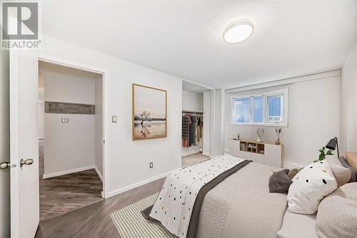 This property has been virtually staged - 301, 1311 15 Avenue Sw, Calgary, AB - Indoor Photo Showing Bedroom