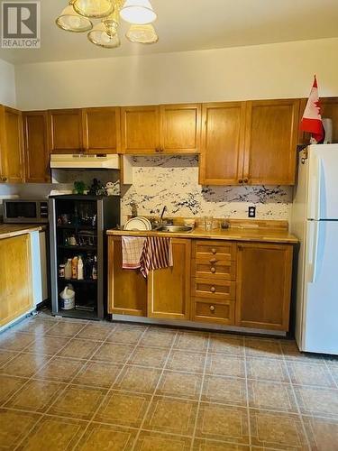 319-321-325-327 Montreal Road, Cornwall (717 - Cornwall), ON - Indoor Photo Showing Kitchen With Double Sink