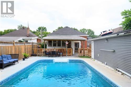 17 Elliott Avenue, Brantford, ON - Outdoor With In Ground Pool With Deck Patio Veranda With Backyard