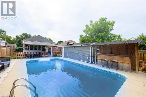 17 Elliott Avenue, Brantford, ON - Outdoor With In Ground Pool With Deck Patio Veranda With Backyard