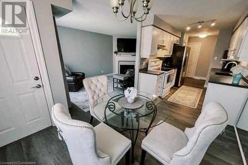 170 Candlewood Drive, Hamilton, ON - Indoor Photo Showing Dining Room With Fireplace