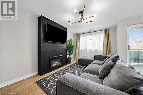 2001 Bonnymede Drive Unit# 88, Mississauga, ON - Indoor Photo Showing Living Room With Fireplace