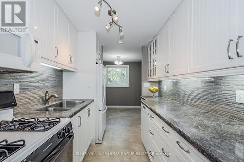 15 - 383 Edinburgh Road S, Guelph (Hanlon Creek), ON - Indoor Photo Showing Kitchen With Double Sink With Upgraded Kitchen