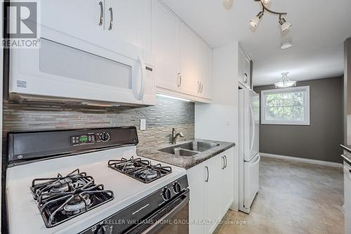 15 - 383 Edinburgh Road S, Guelph (Hanlon Creek), ON - Indoor Photo Showing Kitchen With Double Sink