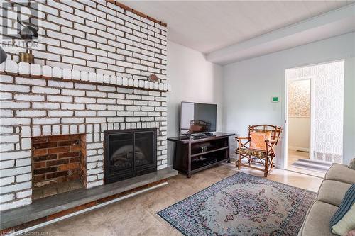 60 Inverness Avenue W, Hamilton, ON - Indoor Photo Showing Living Room With Fireplace