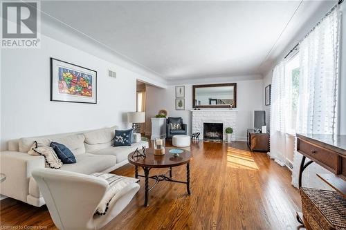 60 Inverness Avenue W, Hamilton, ON - Indoor Photo Showing Living Room With Fireplace