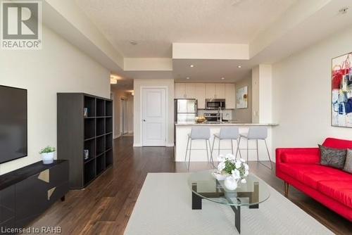 Virtually Staged - 427 Aberdeen Avenue Unit# 104, Hamilton, ON - Indoor Photo Showing Living Room