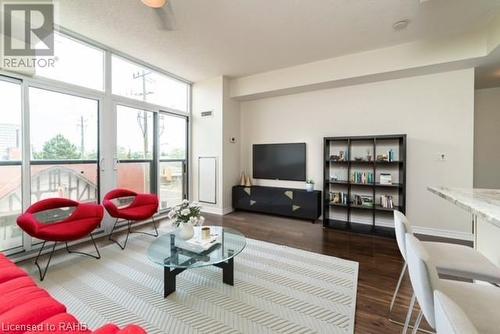 Virtually Staged - 427 Aberdeen Avenue Unit# 104, Hamilton, ON - Indoor Photo Showing Living Room